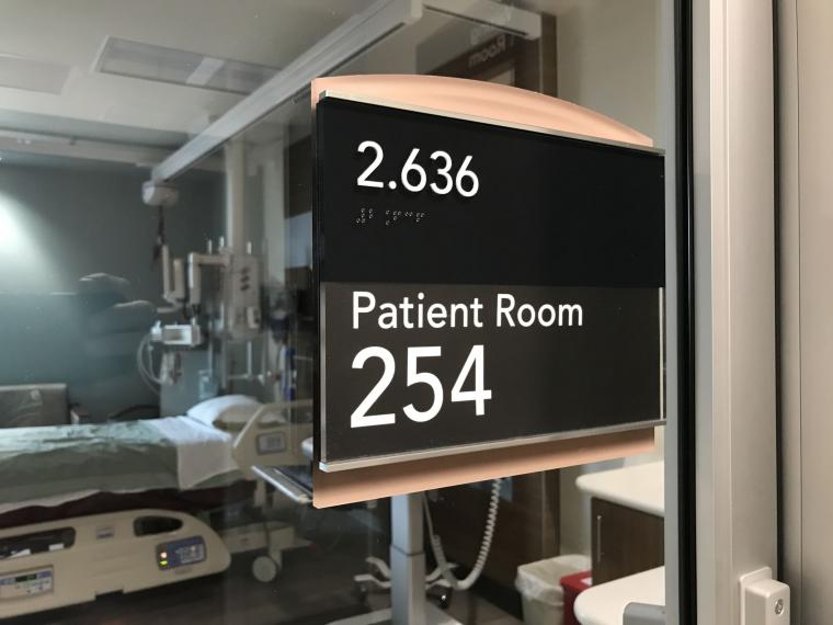 Patient Room Signs with polished edges, aluminum accents.