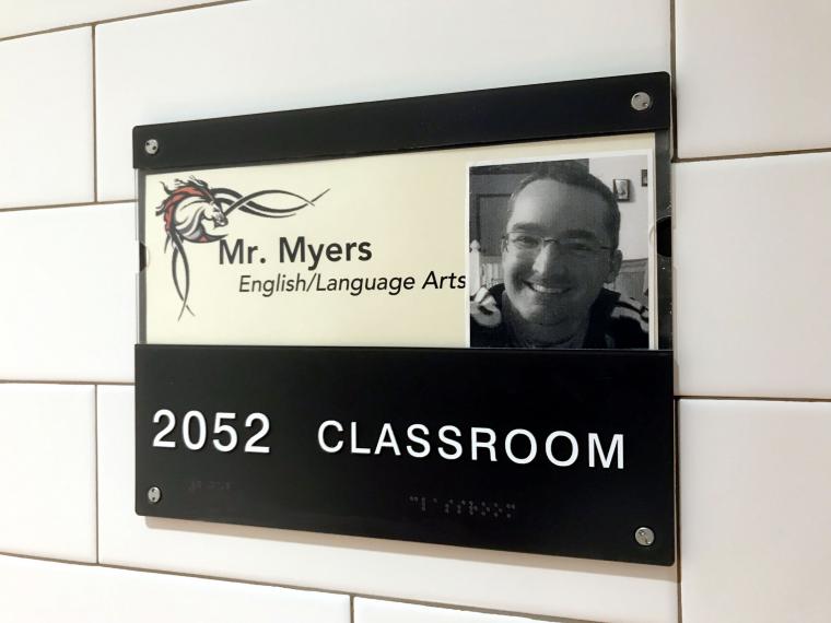 In-house changeable ADA room ID sign with security fasteners.