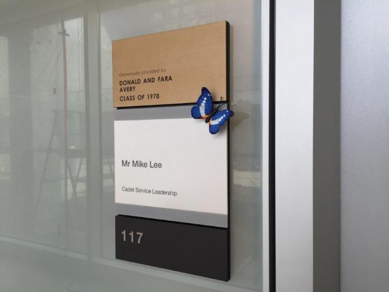 Etched zinc ADA signs incorporating donor recognition.