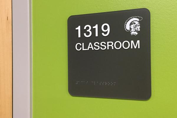 ADA Room ID sign, raised text, braille, school logo digitally printed directly to sign face.