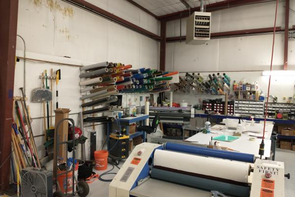 Vinyl department inside Avalis Wayfinding facility