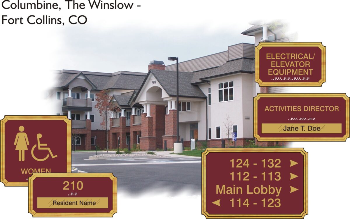 A multi-story residential building labeled "Columbine, The Winslow - Fort Collins, CO" with signs indicating various locations, including a women's restroom, room 210, electrical/elevator equipment, activities director Jane T. Doe, and directions to main lobby and rooms.