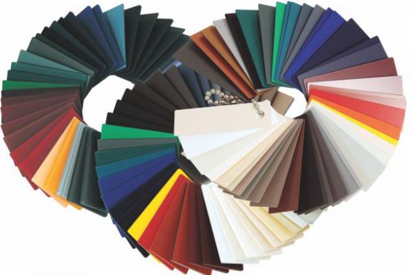 Color swatch fan displaying a wide range of color samples for design use, spread out in an arc.