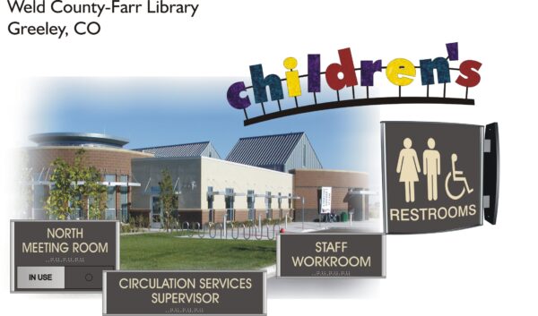 Exterior view of the Weld County-Farr Library in Greeley, CO. The library has a children's section, and signs point to the North Meeting Room, Circulation Services Supervisor, Staff Workroom, and Restrooms.