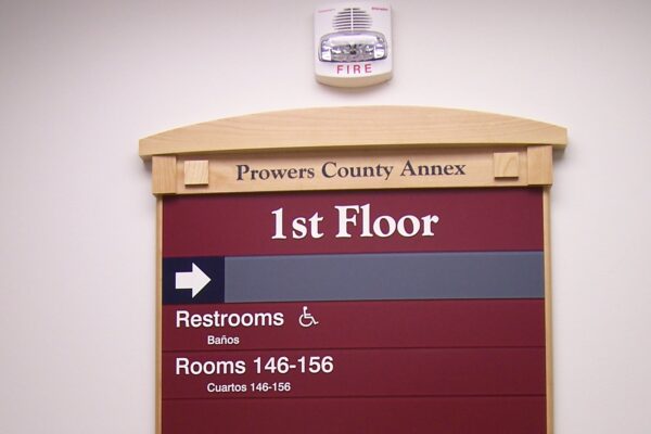 A directory sign for the 1st Floor of the Powers County Annex. It lists locations for restrooms, rooms 146-156, CSU Cooperative Extension, Prowers/Baca O.L.T.C, E.B.T. Cards, Veteran Affairs, Vital Statistics, and rooms 101-143 and 157-162.